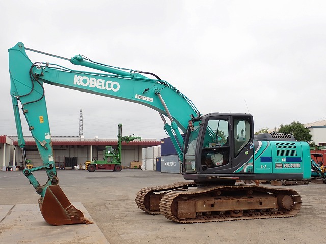 Used Kobelco SK200 excavator at a Japanese equipment yard